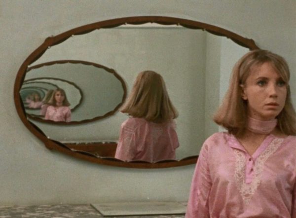 Pauline / Emilie (Bulle Ogier) trapped Citizen Kane-style between infinite mirrors.